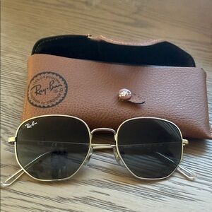 Ray-Ban Women's Gold Frame Sunglasses with Black Lenses and Hexagonal Shape